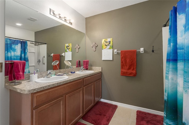 bathroom with vanity, tile patterned floors, and a shower with shower curtain