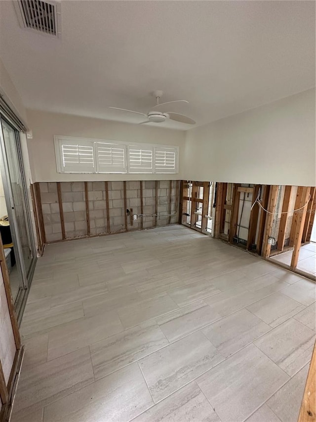 empty room featuring ceiling fan