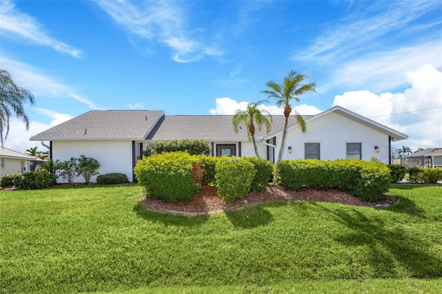 exterior space with a front lawn