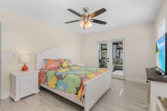 bedroom featuring french doors, ceiling fan, light hardwood / wood-style flooring, and access to exterior