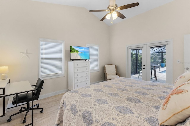 bedroom with ceiling fan, access to outside, high vaulted ceiling, light wood-type flooring, and french doors