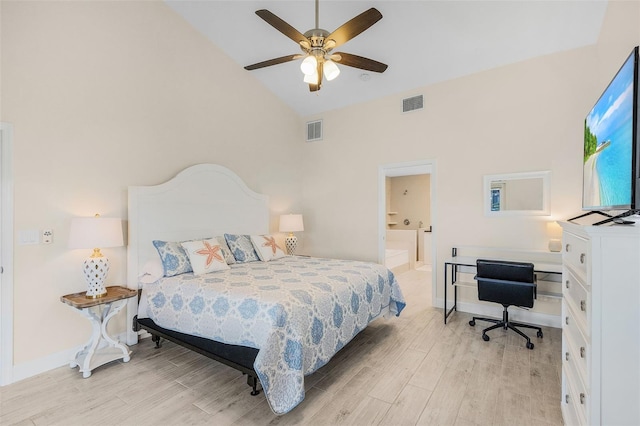 bedroom with light hardwood / wood-style flooring, ensuite bathroom, high vaulted ceiling, and ceiling fan