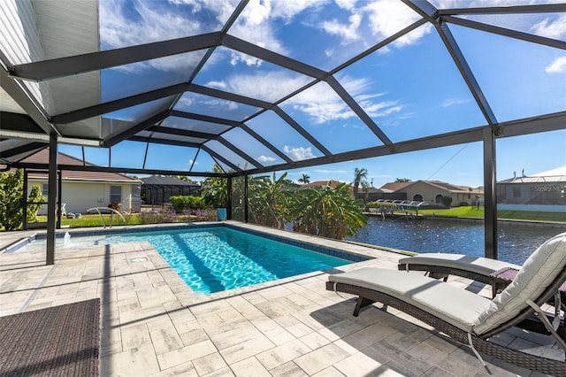 view of swimming pool featuring a water view, a patio, pool water feature, and glass enclosure