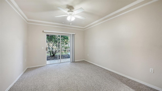 unfurnished room featuring ornamental molding, carpet, and ceiling fan