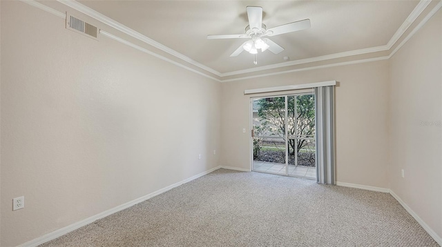 carpeted empty room with ornamental molding and ceiling fan