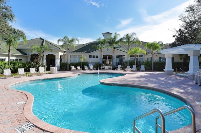 view of pool featuring a patio area