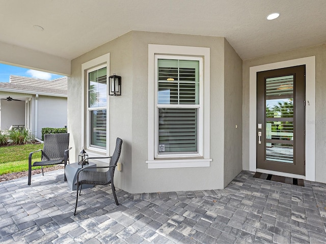 property entrance with a patio area