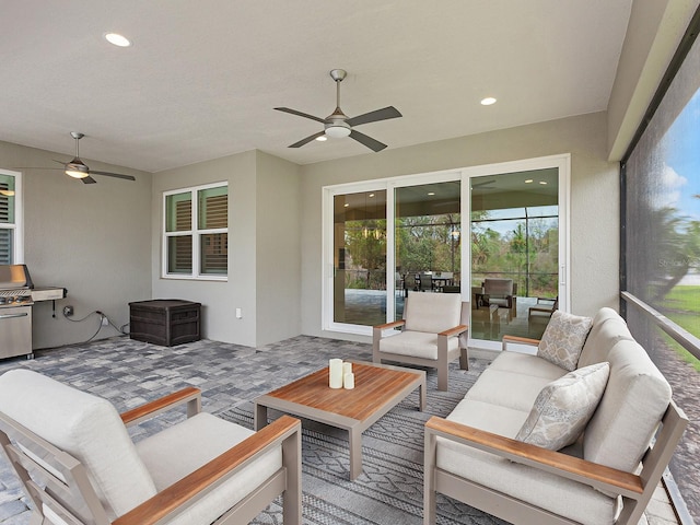 exterior space with ceiling fan