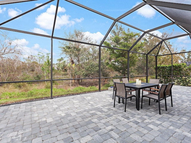 view of patio with a lanai