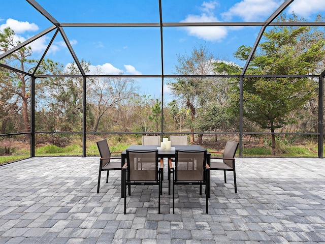 view of patio with a lanai