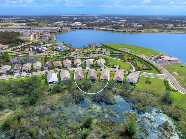 drone / aerial view featuring a water view