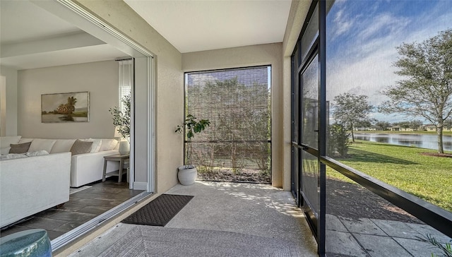 sunroom with a water view