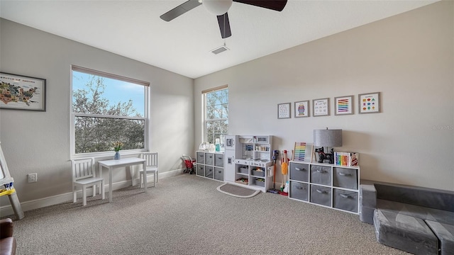 rec room featuring carpet floors, vaulted ceiling, and ceiling fan