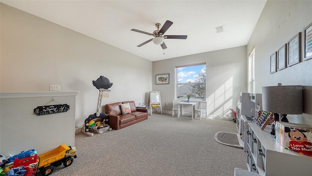 recreation room featuring carpet floors and ceiling fan