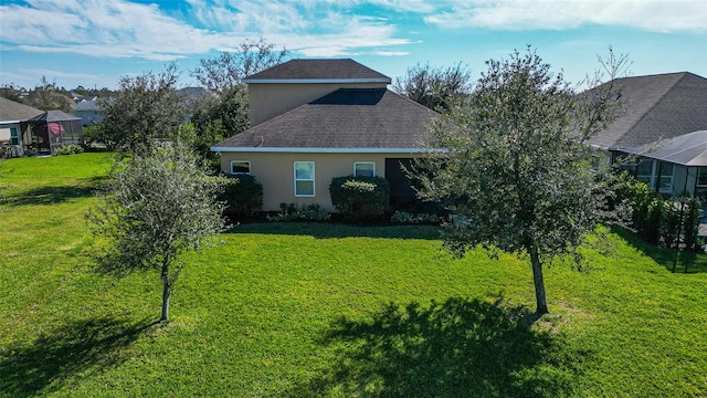 exterior space with a lawn