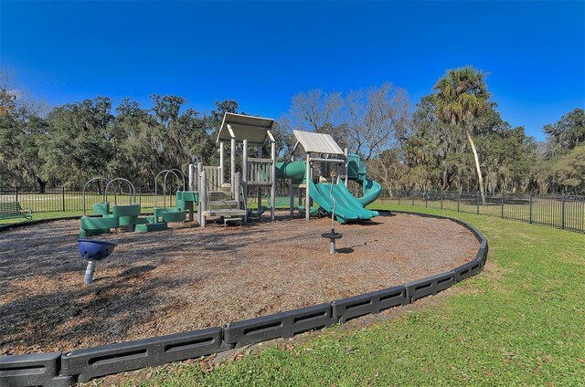 view of playground featuring a yard