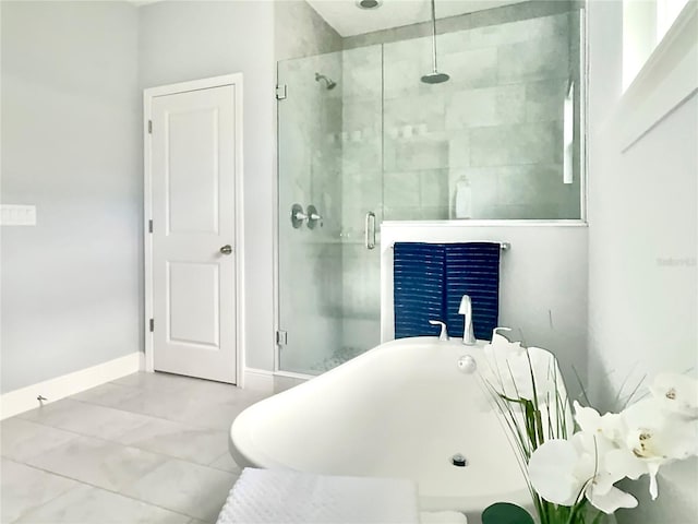 bathroom with shower with separate bathtub