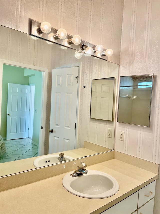 bathroom with vanity and tile patterned floors