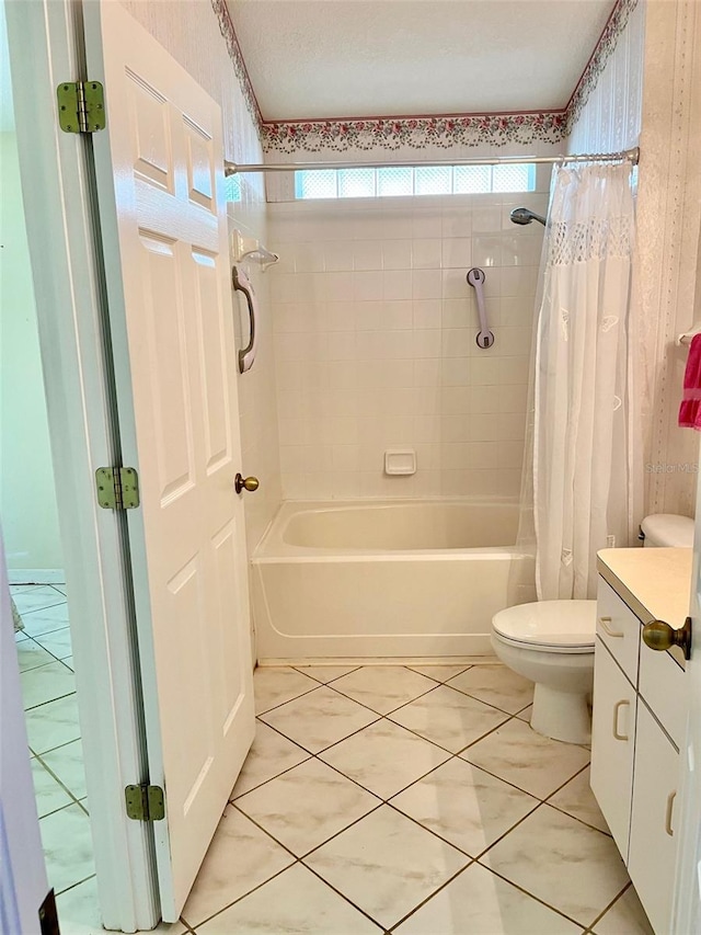 full bathroom with vanity, shower / tub combo with curtain, and toilet