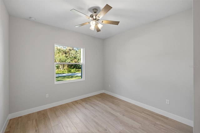 unfurnished room with light hardwood / wood-style flooring and ceiling fan