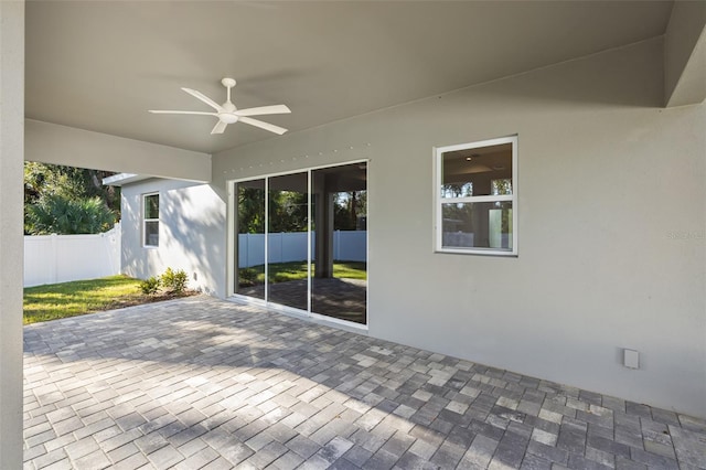 view of patio / terrace featuring ceiling fan