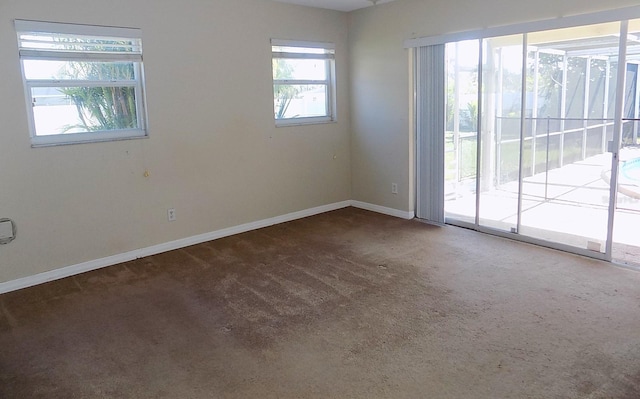 view of carpeted spare room