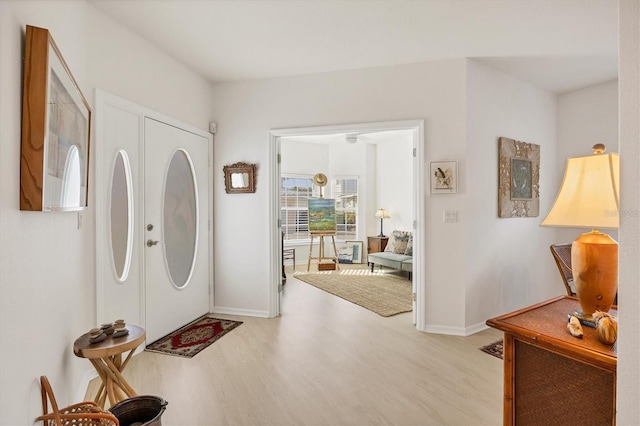 entryway with light wood-type flooring