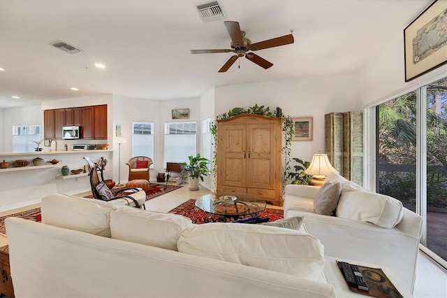 living room with ceiling fan