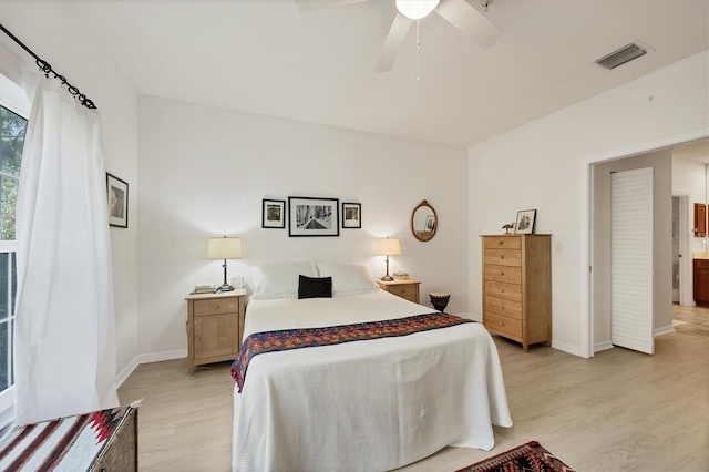 bedroom featuring light wood-type flooring and ceiling fan