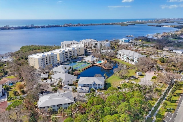 bird's eye view with a water view