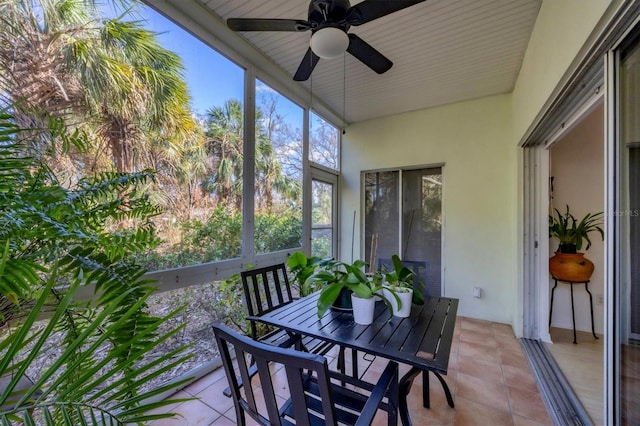 sunroom / solarium with ceiling fan