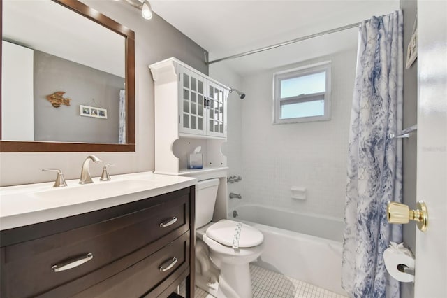 full bathroom featuring vanity, tile patterned flooring, toilet, and shower / tub combo