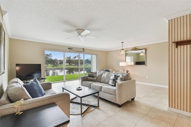 living room featuring ornamental molding, a textured ceiling, and ceiling fan