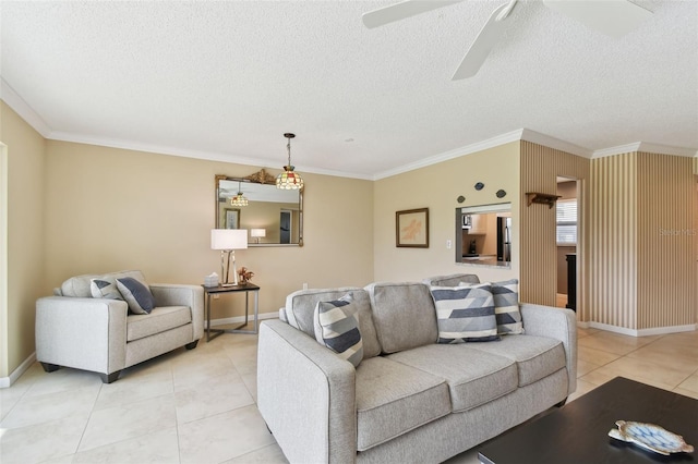 living room with ornamental molding, a textured ceiling, and ceiling fan