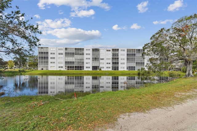 view of property with a water view