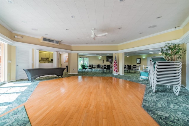 miscellaneous room featuring hardwood / wood-style flooring, crown molding, and ceiling fan