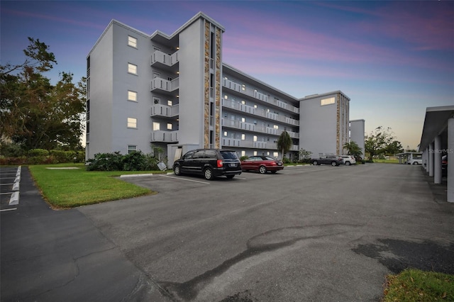 view of outdoor building at dusk