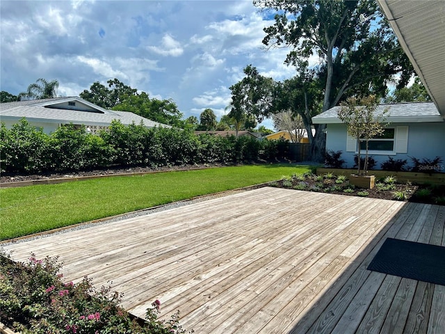 deck featuring a yard