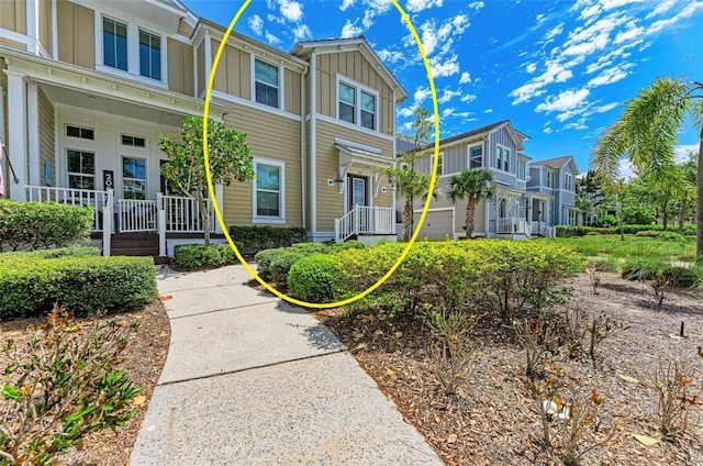 view of property with a porch