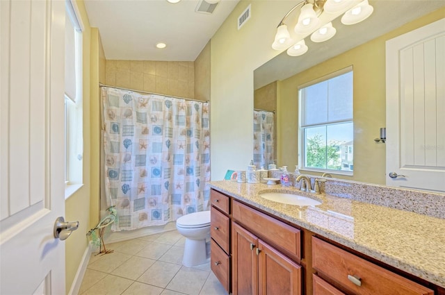 full bathroom featuring vanity, shower / bathtub combination with curtain, toilet, and tile patterned flooring