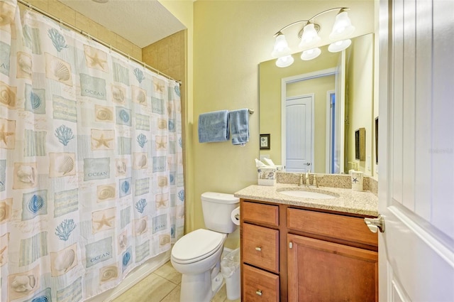 bathroom with walk in shower, vanity, toilet, and tile patterned floors