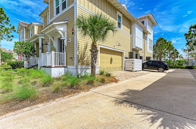 view of property exterior with a garage