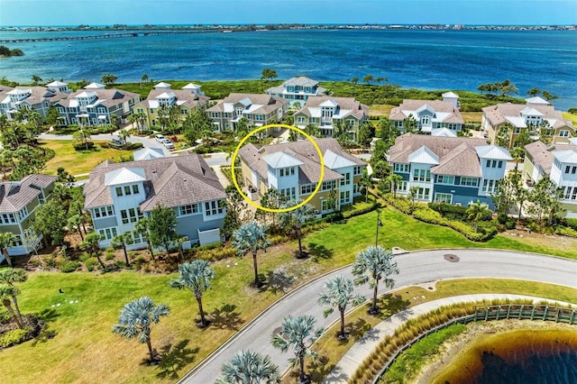 drone / aerial view with a water view