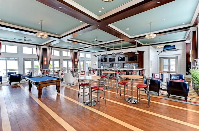 playroom with coffered ceiling, beamed ceiling, hardwood / wood-style floors, billiards, and ceiling fan