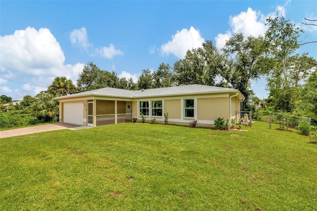 ranch-style home with a garage and a front yard