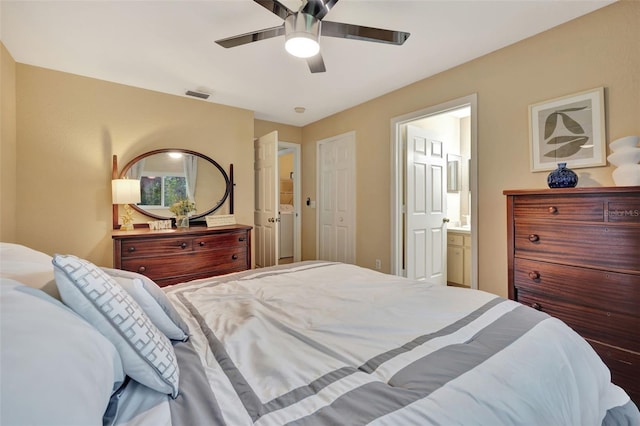 bedroom featuring ensuite bath and ceiling fan