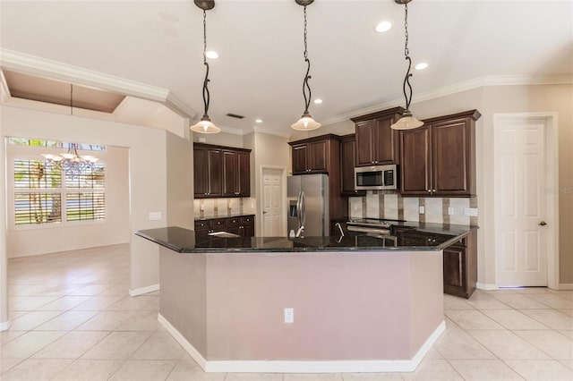 kitchen with appliances with stainless steel finishes, backsplash, pendant lighting, and dark stone countertops