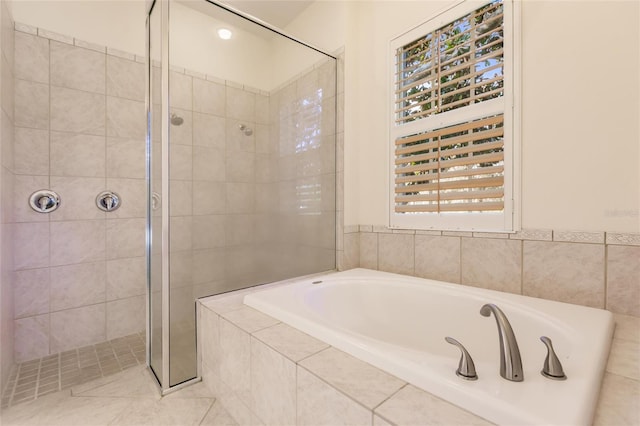 bathroom featuring plus walk in shower