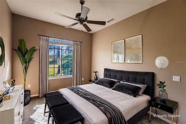 carpeted bedroom featuring ceiling fan