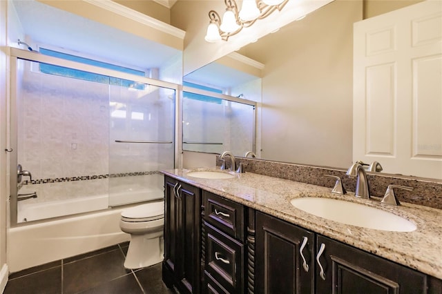 full bathroom with tile patterned flooring, vanity, toilet, and enclosed tub / shower combo